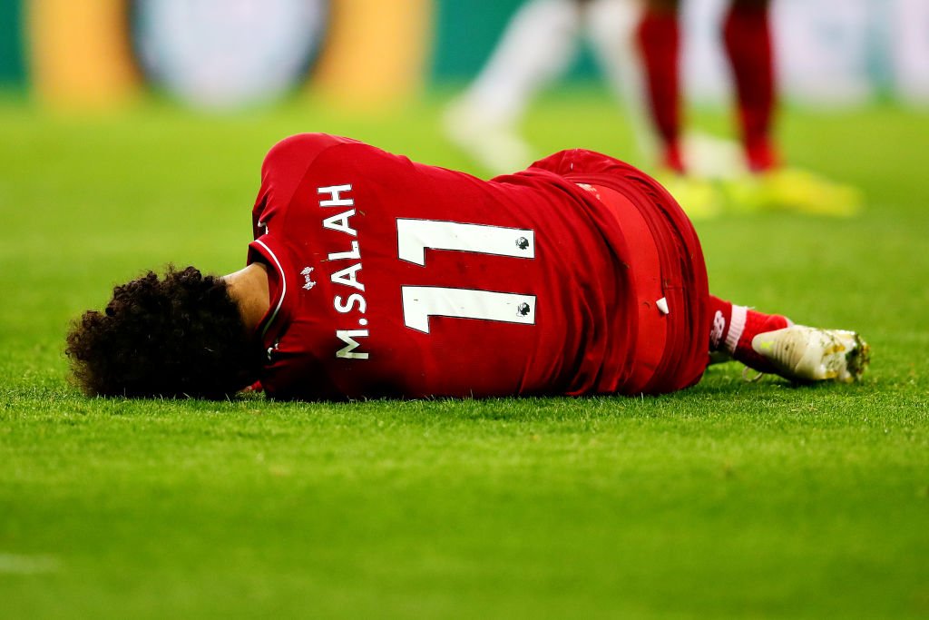 Liverpool star Mohamed Salah stretchered off after head injury