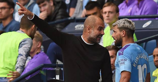 Guardiola held back after heated touchline row with Sergio Aguero